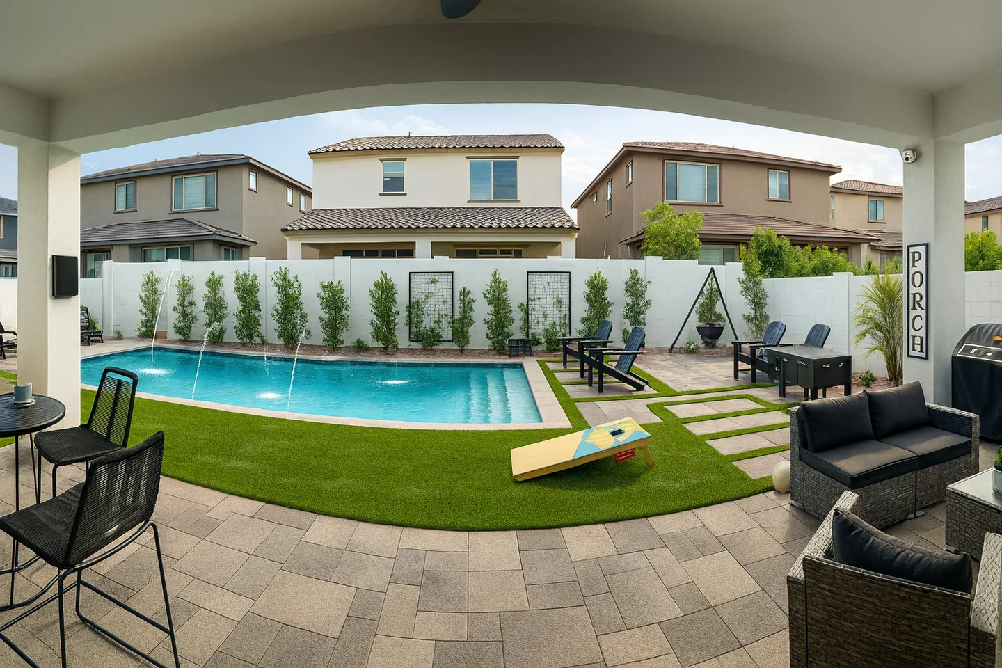 Concept image of a family pool with turf and outdoor games