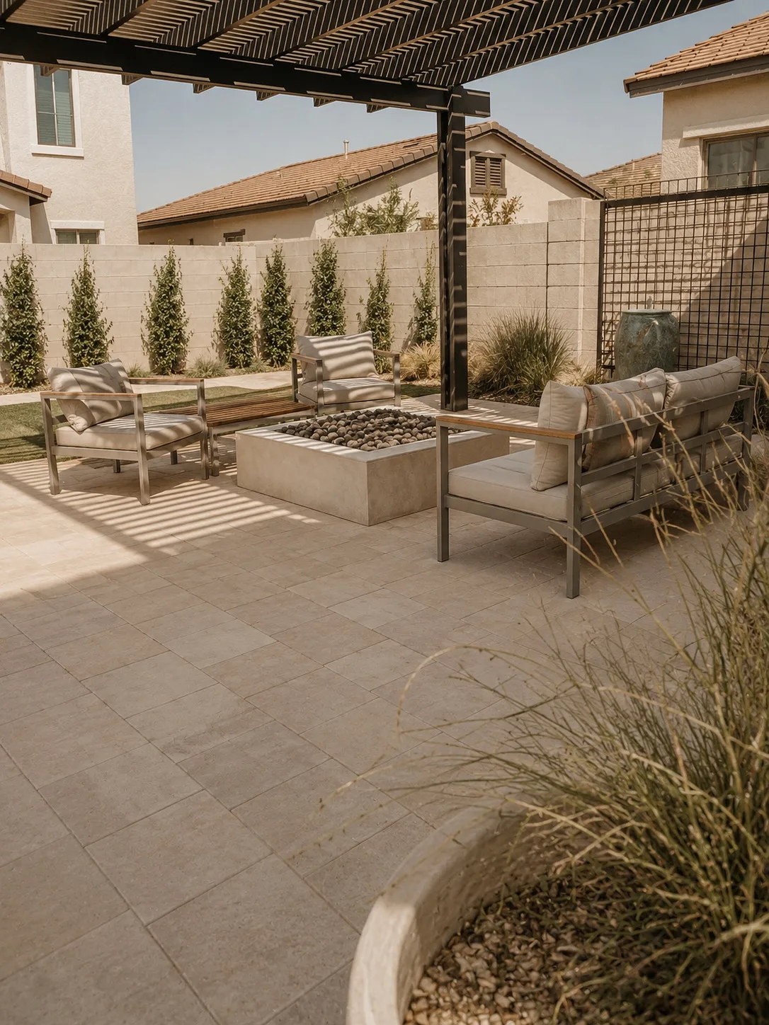 Concept image of a shaded outdoor lounge and dining area
